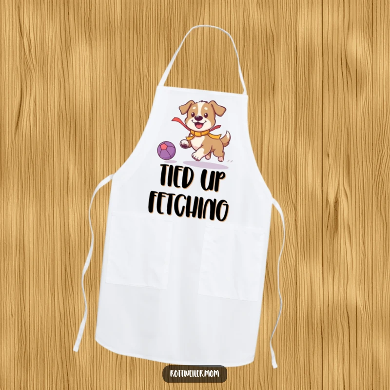 Funny Playful Dog Apron: Dog with a bright ribbon chases a bouncing ball, a humorous and practical kitchen accessory.