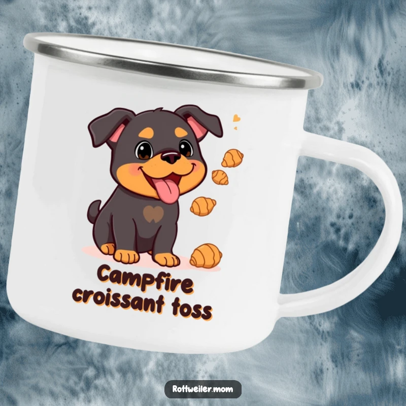 Funny Kawaii Rottweiler juggling croissants on a camping mug, ready for outdoor culinary fun.