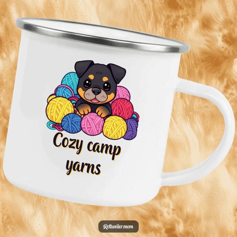 Funny Kawaii Rottweiler peeking from yarn balls on a camping mug, ready for cozy outdoor fun.