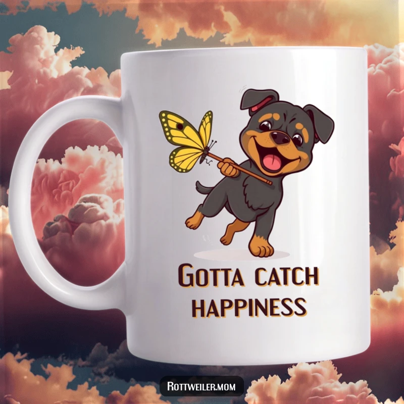 Funny Rottweiler Butterfly Chase Mug shows a determined dog with a net, excitedly pursuing a huge, colorful butterfly in a playful scene.