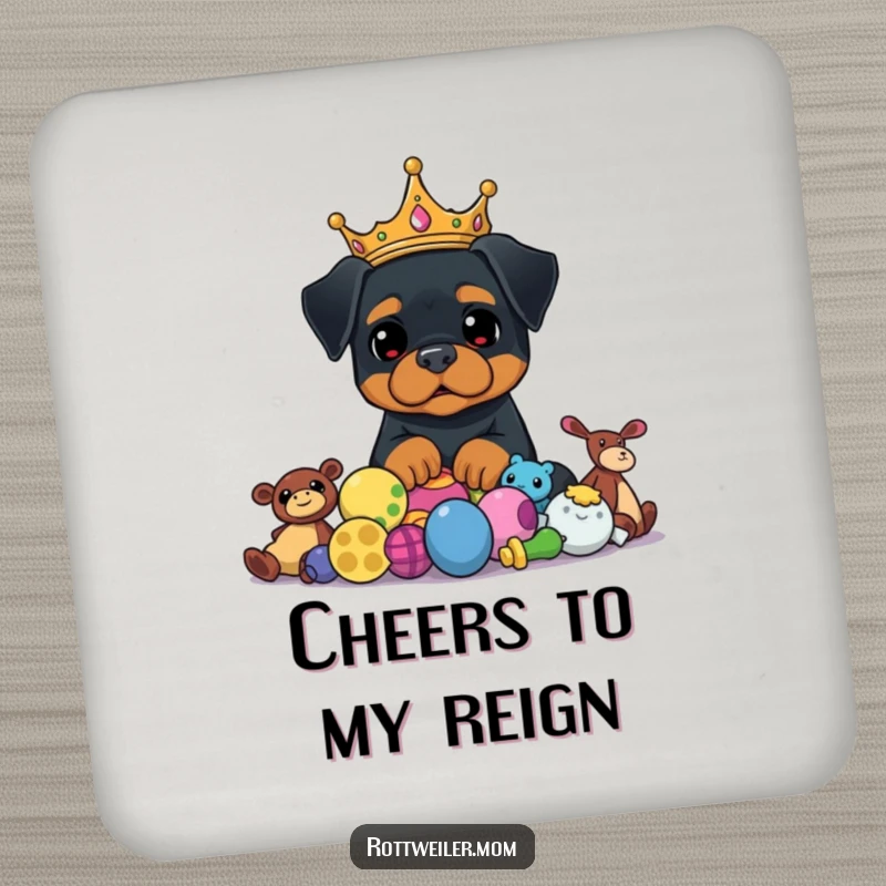 Funny Rottweiler King Coaster depicts a crowned dog proudly watching over a pile of toys, offering humorous drink protection.