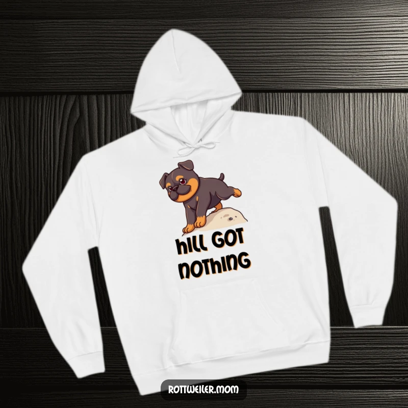 Funny Kawaii Rottweiler Hoodie featuring a determined cute dog scaling a small hill, symbolizing effort and humor.