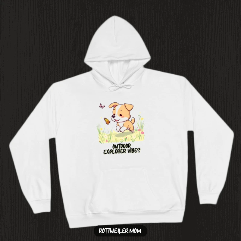 Funny dog hoodie showing a playful dog running after a butterfly in a sunny meadow, capturing a moment of pure, unadulterated fun.