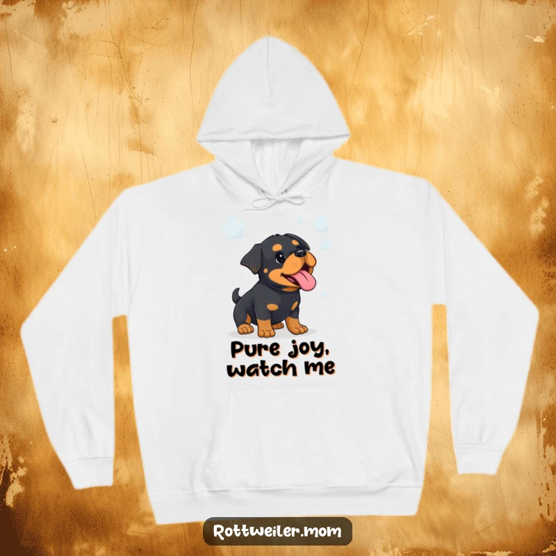 Funny Kawaii Rottweiler, tongue out in concentration, playfully trying to catch bubbles, printed on a soft hoodie.