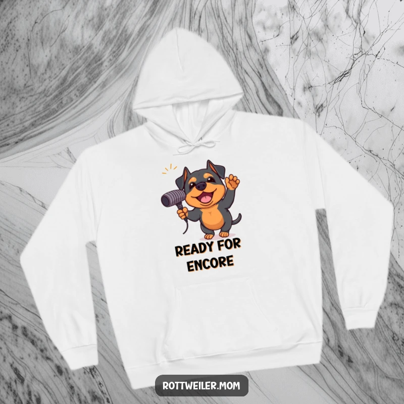 Funny Rottweiler hoodie featuring an excited dog holding a giant microphone, ready for a passionate musical performance, warm and fun.