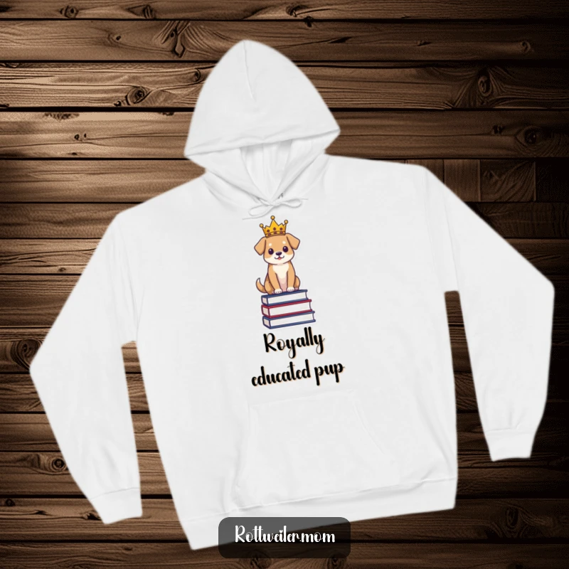 Funny Regal Dog Hoodie: Dog wearing a crown sits on books, offering warm, wise, and humorous comfort.