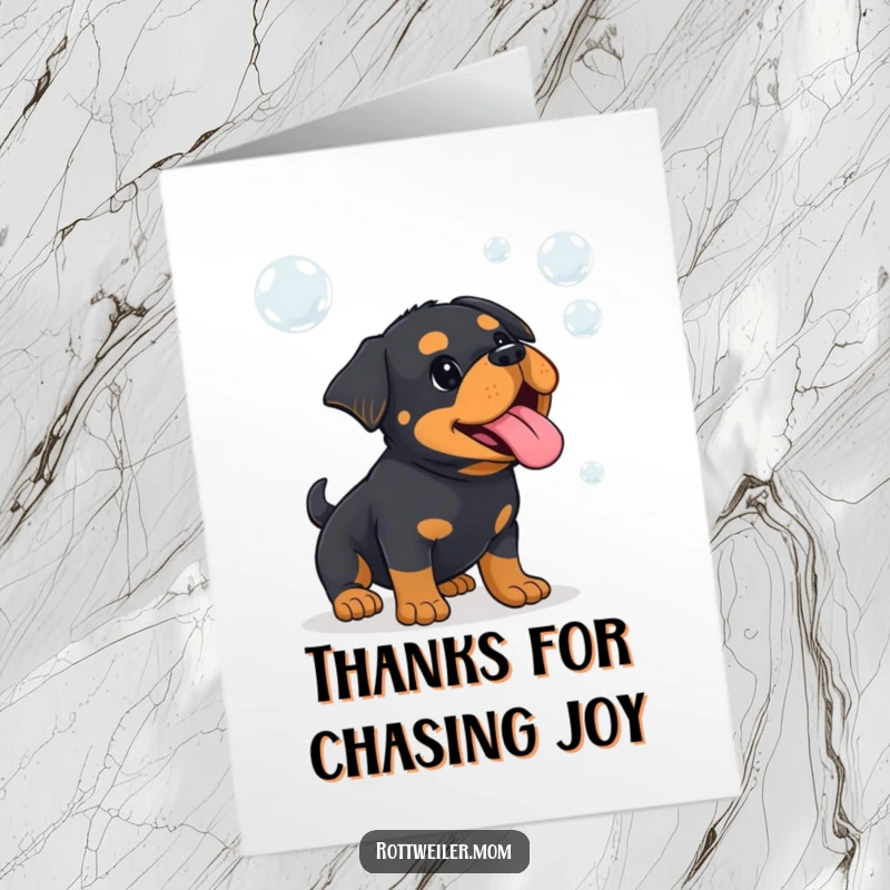 Funny Free Printable Thank You Card: Kawaii Rottweiler with tongue out playfully catching bubbles, sending thanks.