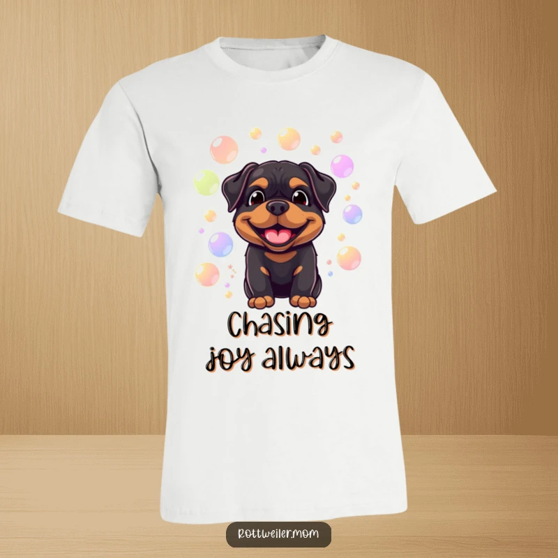Funny t-shirt showcasing a smiling Rottweiler surrounded by floating, colorful bubbles, capturing playful and humorous canine delight.