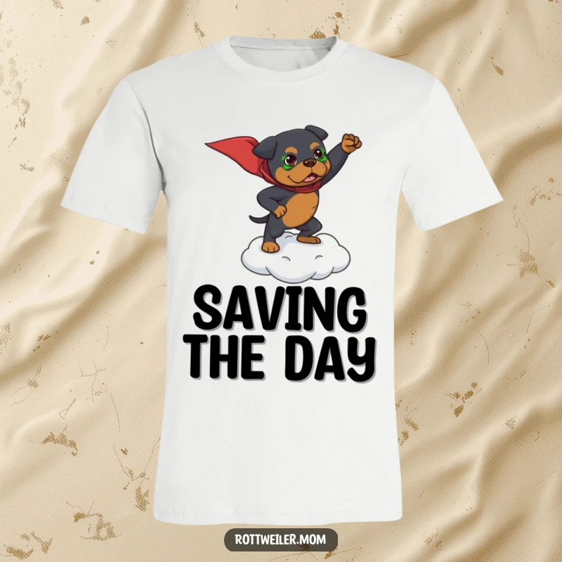Funny t-shirt with a Rottweiler striking a dramatic superhero pose atop a miniature cloud, showcasing brave and heroic energy.