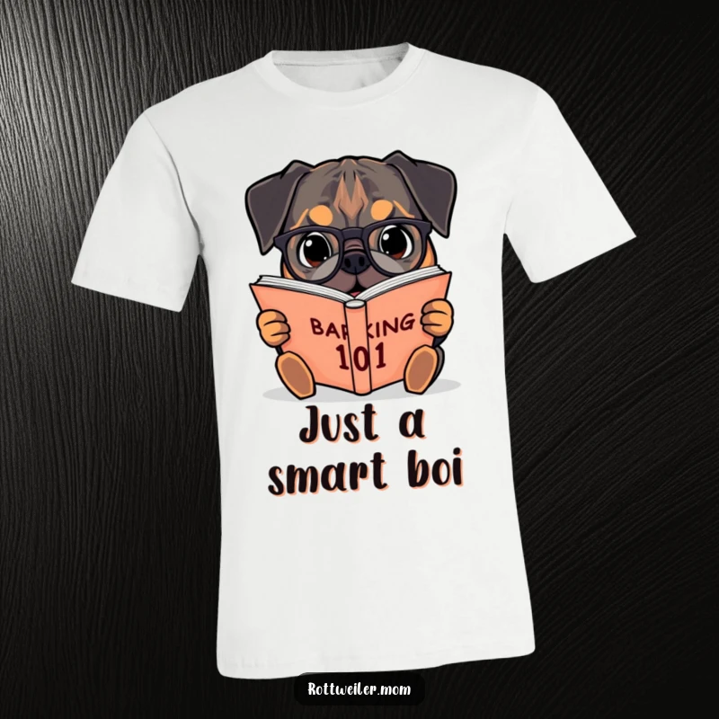 Funny t-shirt with a Rottweiler wearing glasses, enthusiastically reading a giant book labeled Barking 101, a true academic canine.
