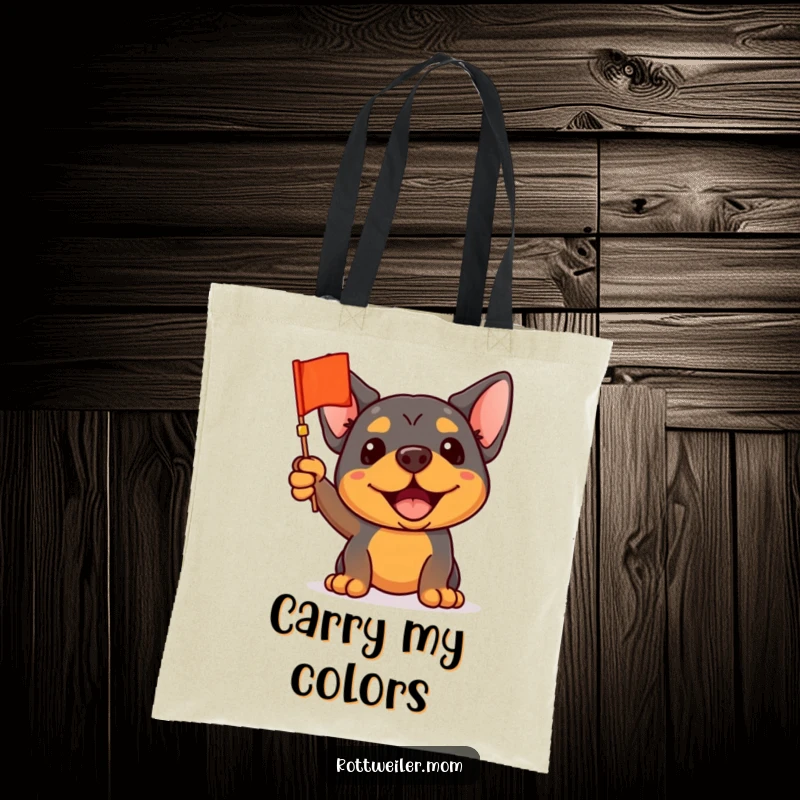 Funny Rottweiler Tote Bag: A rottweiler waving a tiny flag, ideal for carrying essentials while showing team spirit.