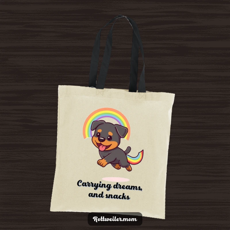 Funny Kawaii Rottweiler energetically pursuing a brilliant rainbow tail on a tote bag, a humorous and eye-catching accessory.