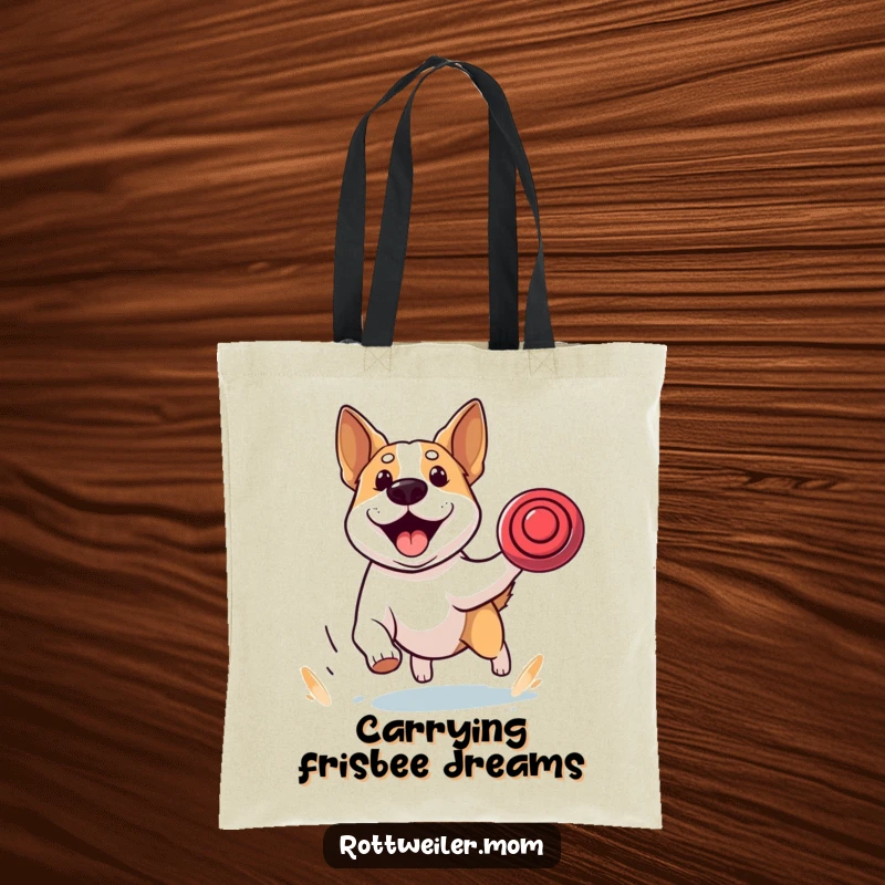 Funny tote bag featuring a stocky dog with alert ears, intensely focused on chasing a frisbee, embodying pure athletic energy and drive.