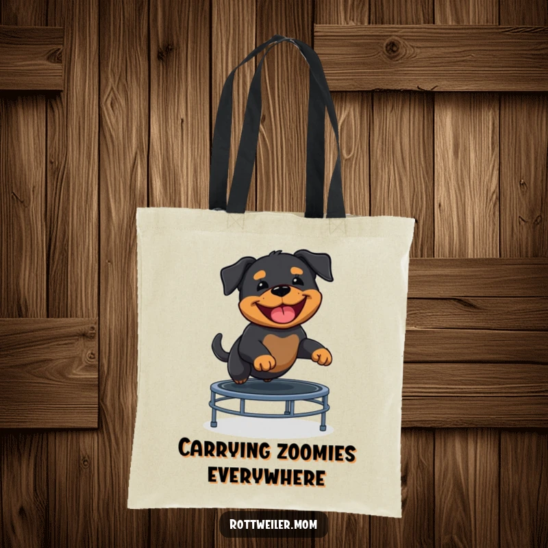 Funny Rottweiler puppy jumps joyfully on a trampoline, a hilarious addition to this practical tote bag.